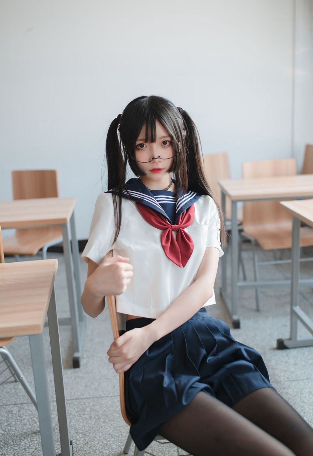 ภาพถ่ายความคมชัดสูงของสาวคอสเพลย์ขนาดใหญ่ในภาพยนตร์เซ็กซี่ถุงน่องดำ