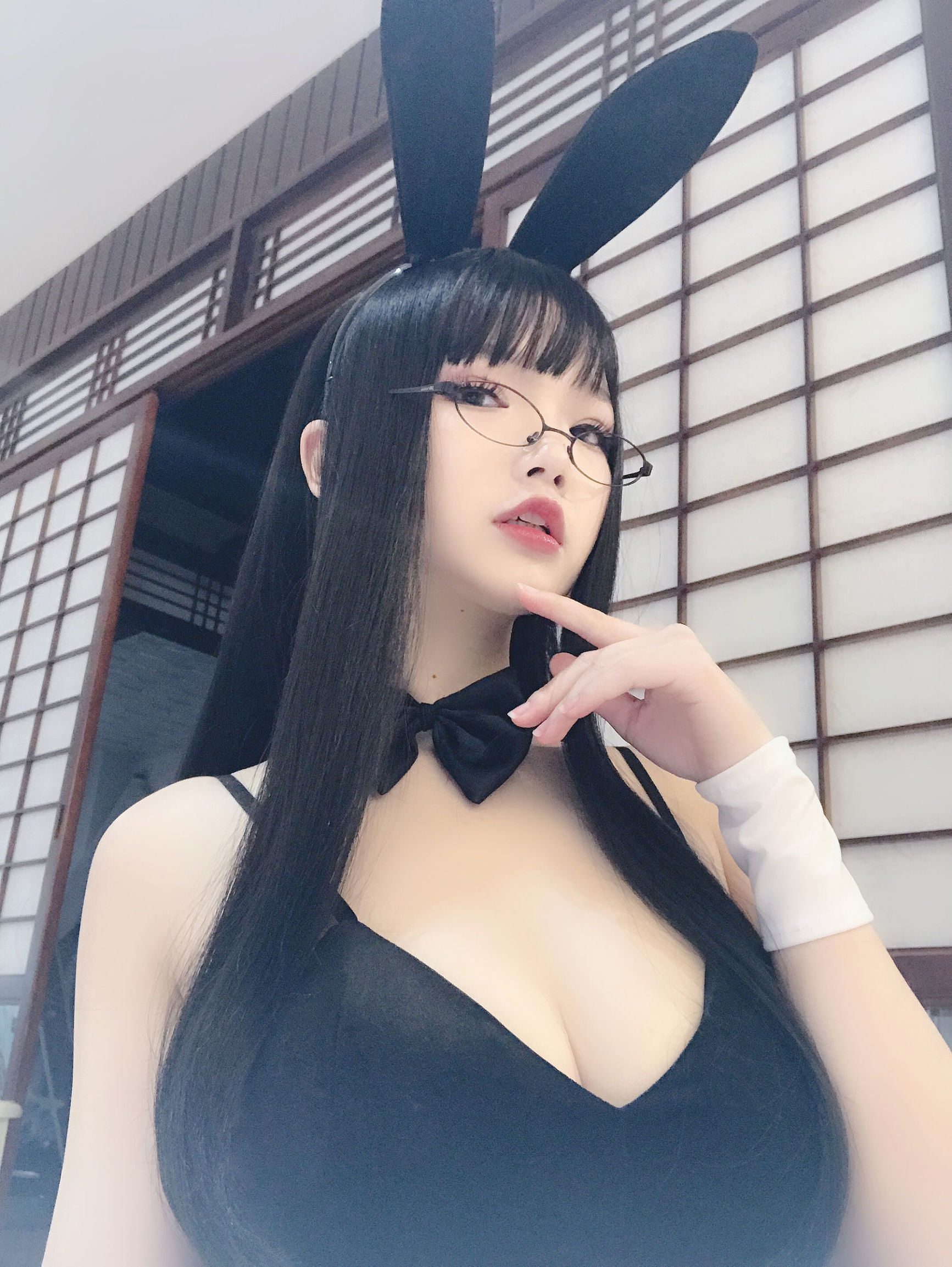 Anime blogger Xueqing Astra in eyeglasses rabbit cosplay