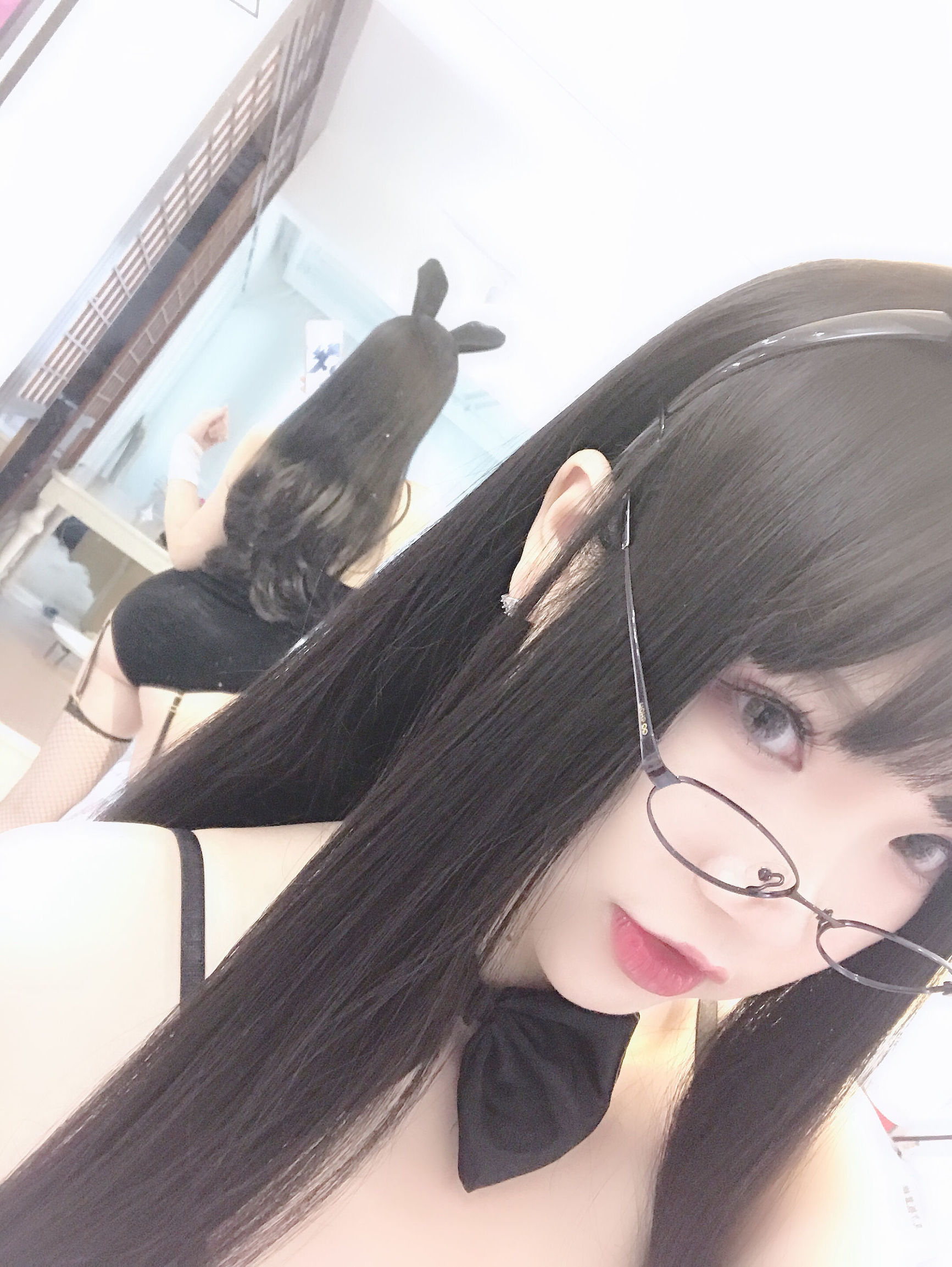 Anime blogger Xueqing Astra in eyeglasses rabbit cosplay
