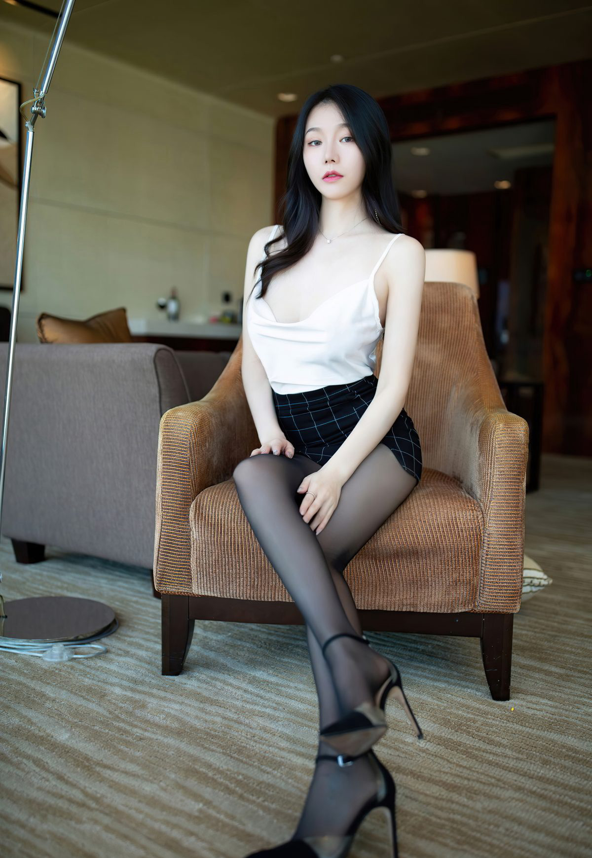 An Ran Maleah: Fair-skinned and beautiful young married woman in black silk stockings, seductive puckered buttocks pose, flirtatiously entering.