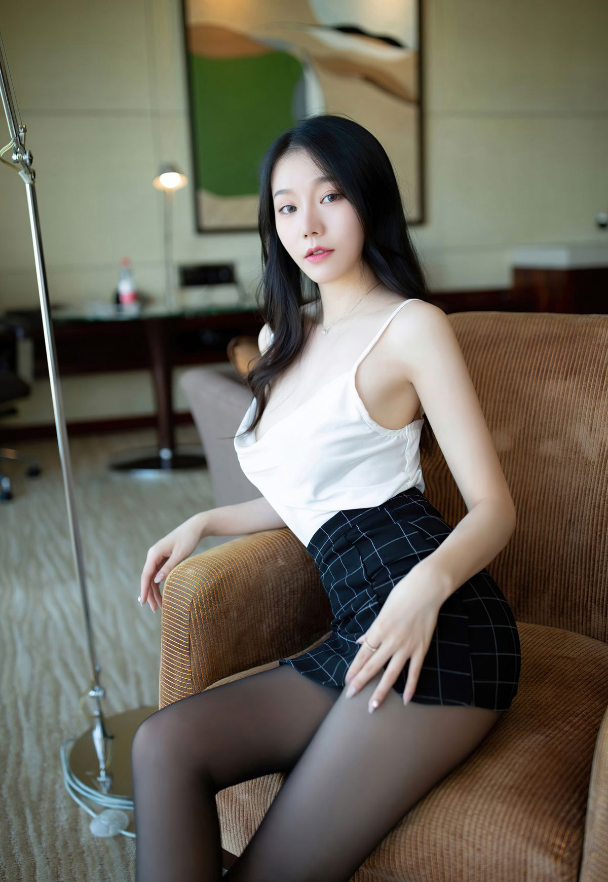 An Ran Maleah: Fair-skinned and beautiful young married woman in black silk stockings, seductive puckered buttocks pose, flirtatiously entering.