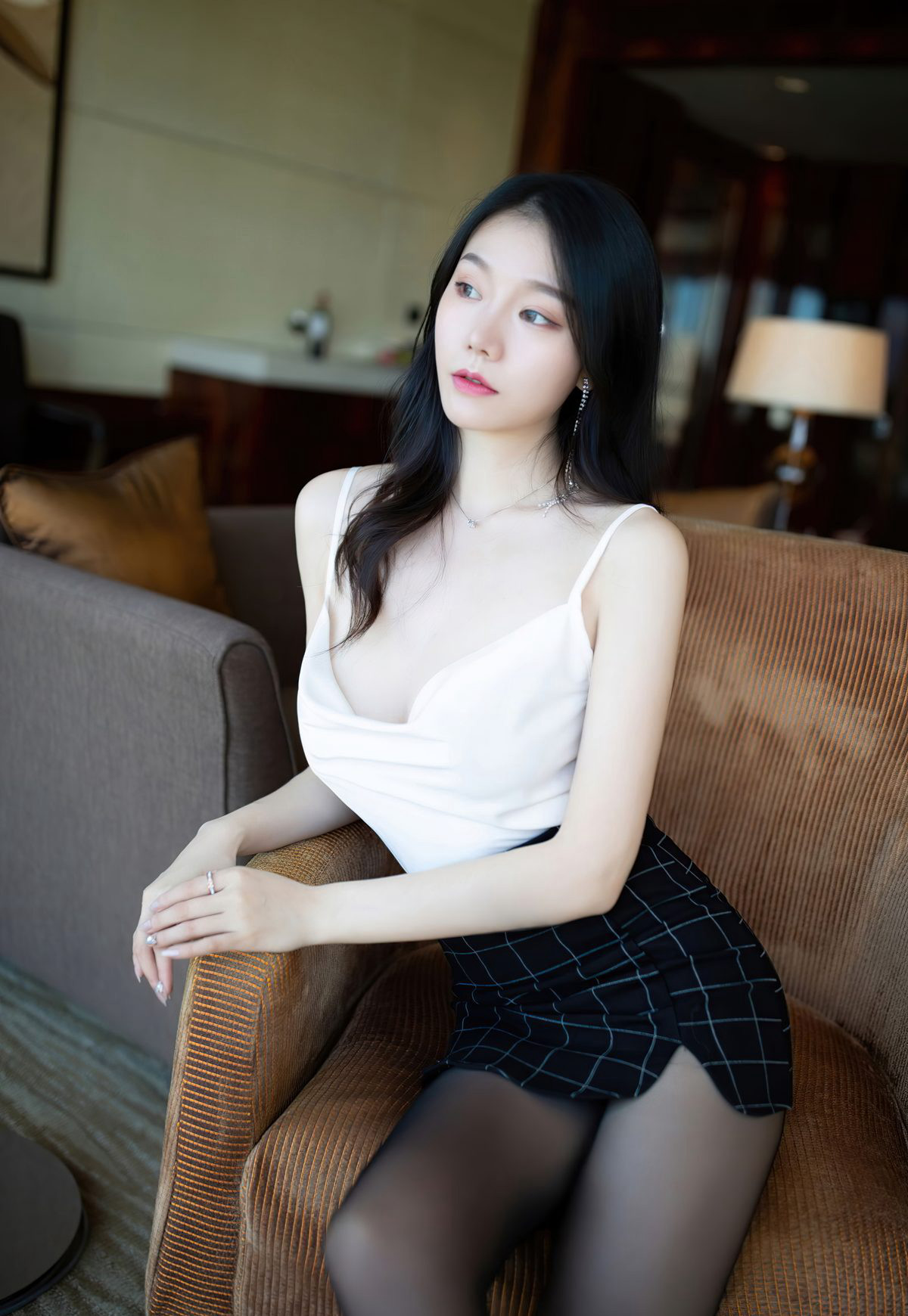 An Ran Maleah: Fair-skinned and beautiful young married woman in black silk stockings, seductive puckered buttocks pose, flirtatiously entering.